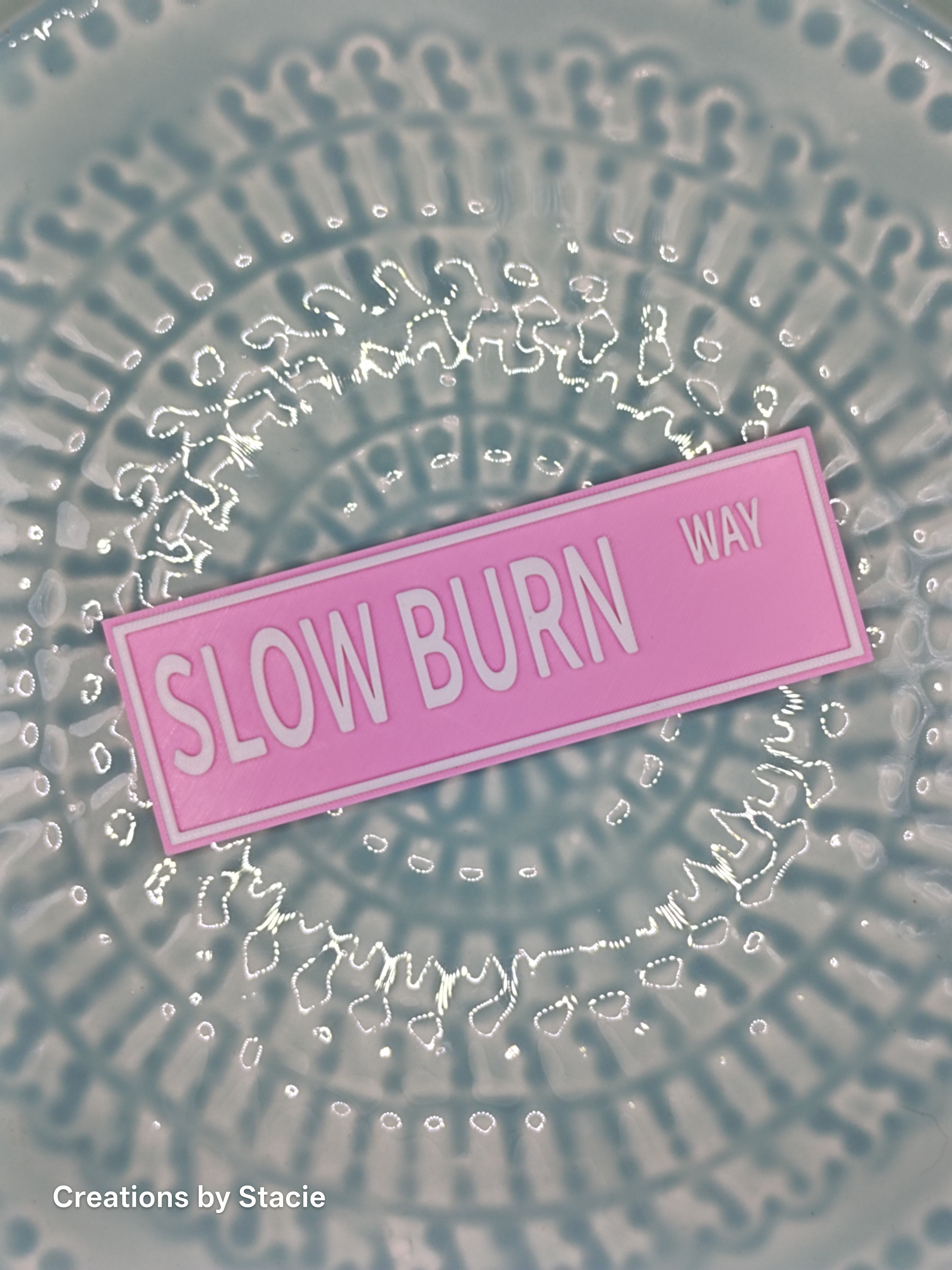 Slow burn way book shelf sign