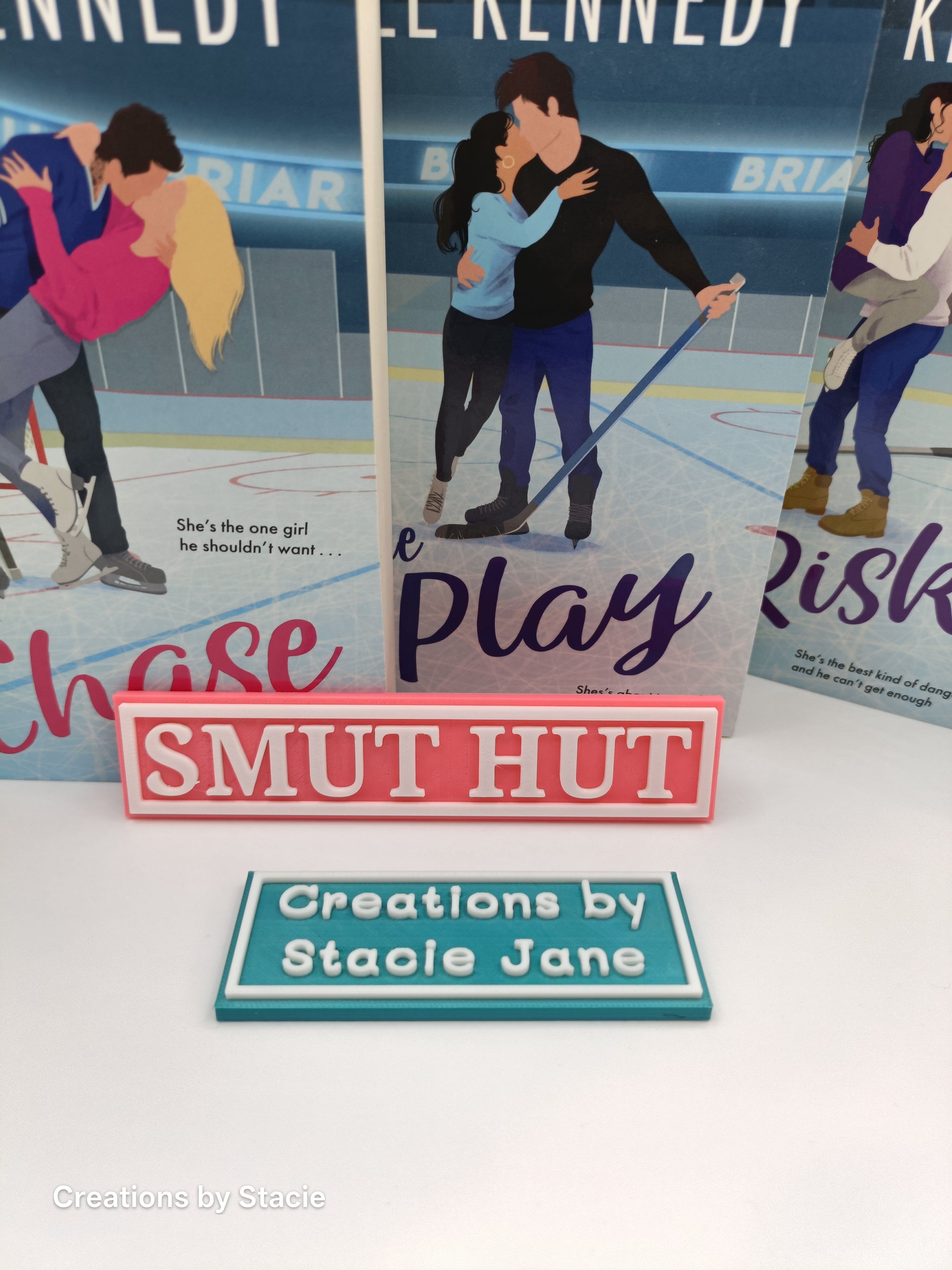 Smut book shelf sign
