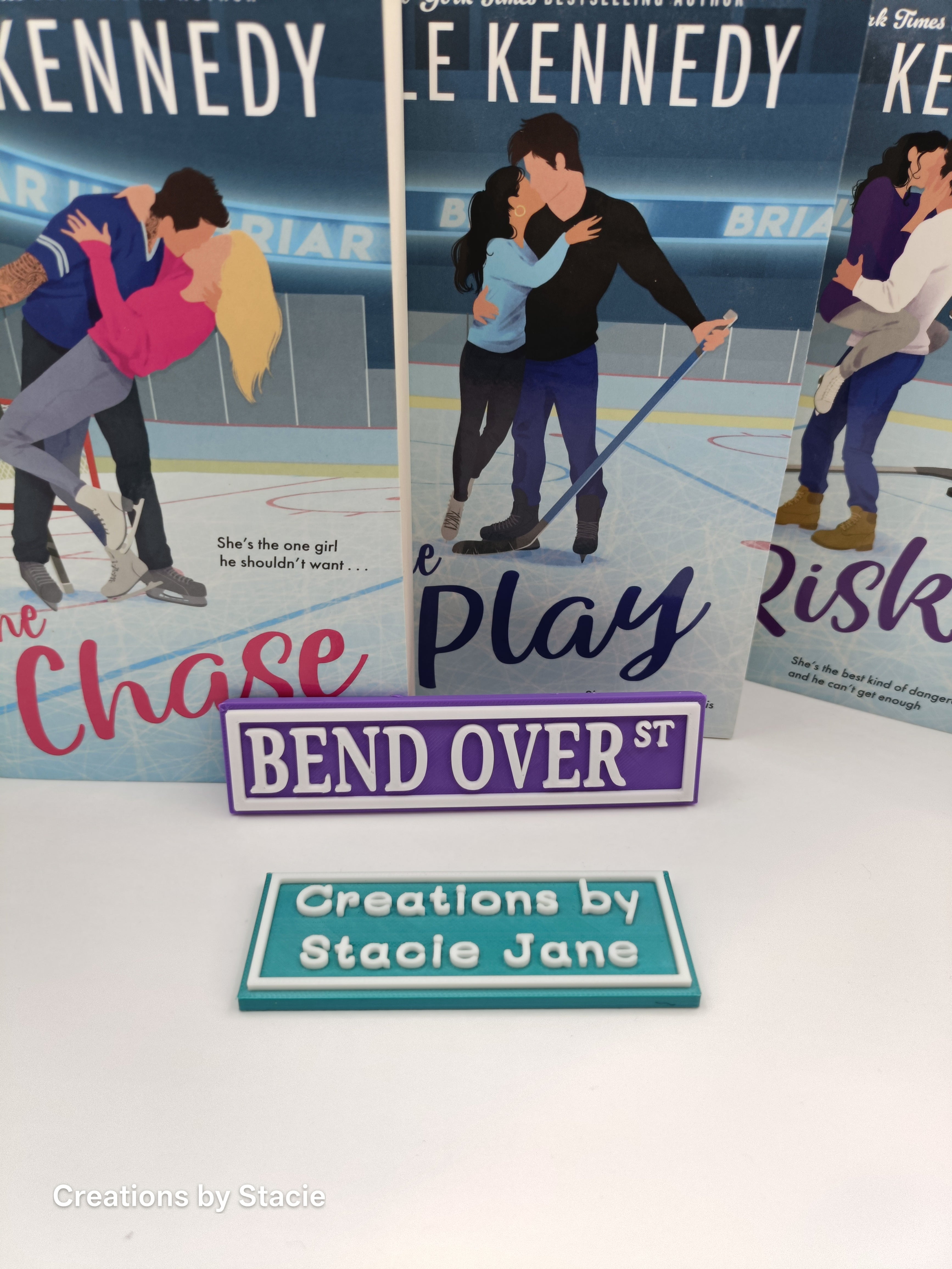 Bend Over book shelf sign