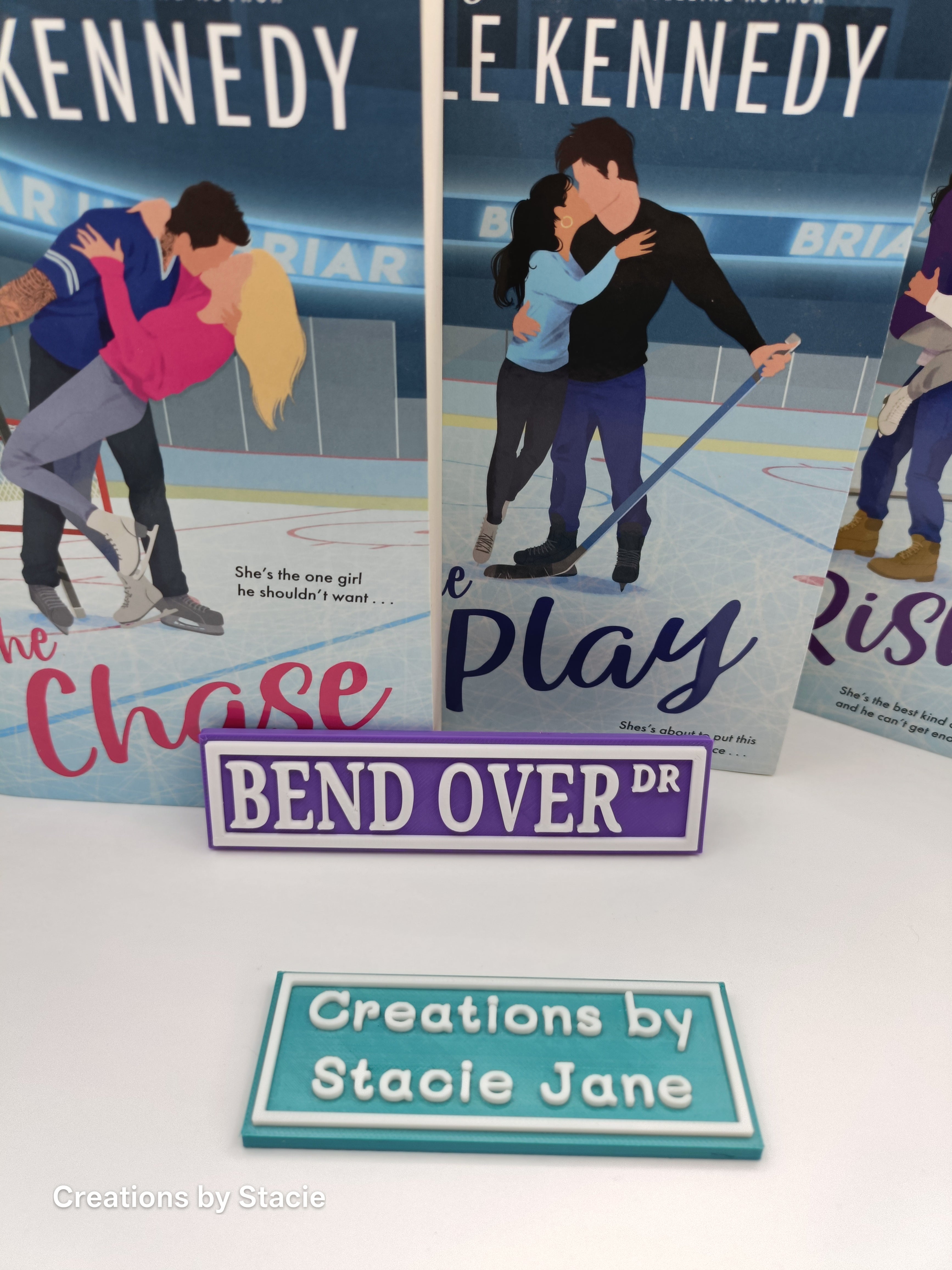 Bend Over book shelf sign