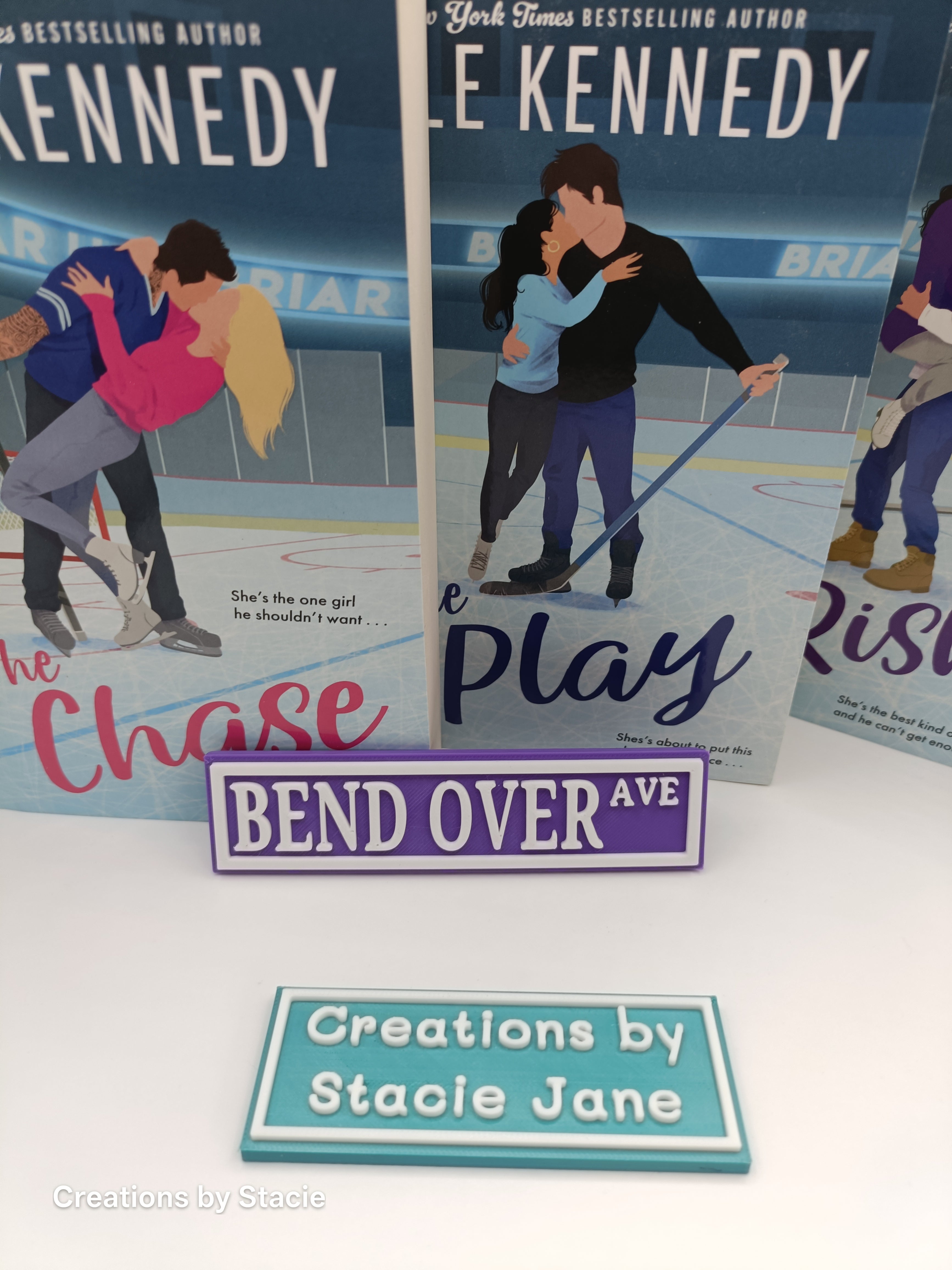 Bend Over book shelf sign