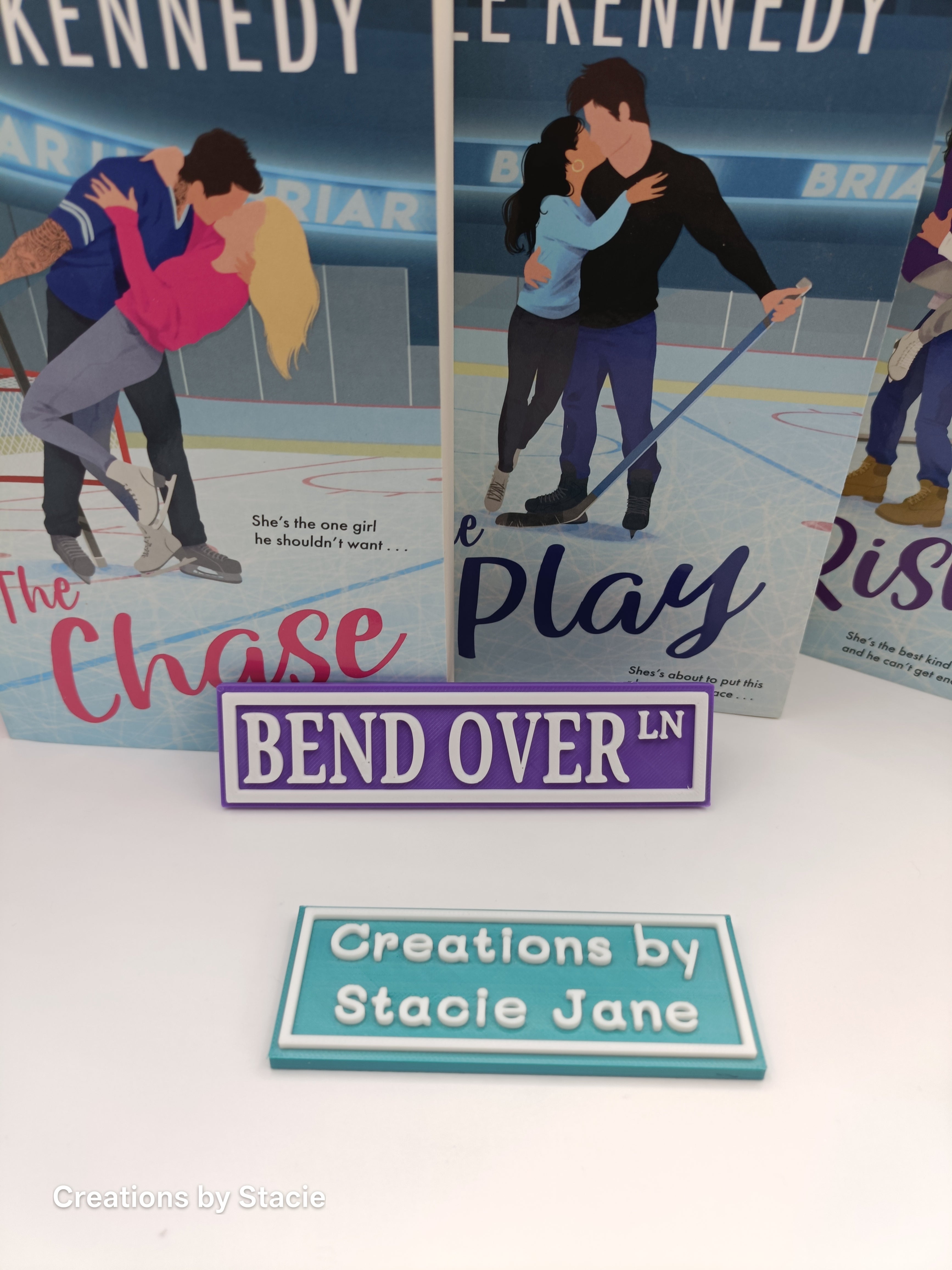 Bend Over book shelf sign