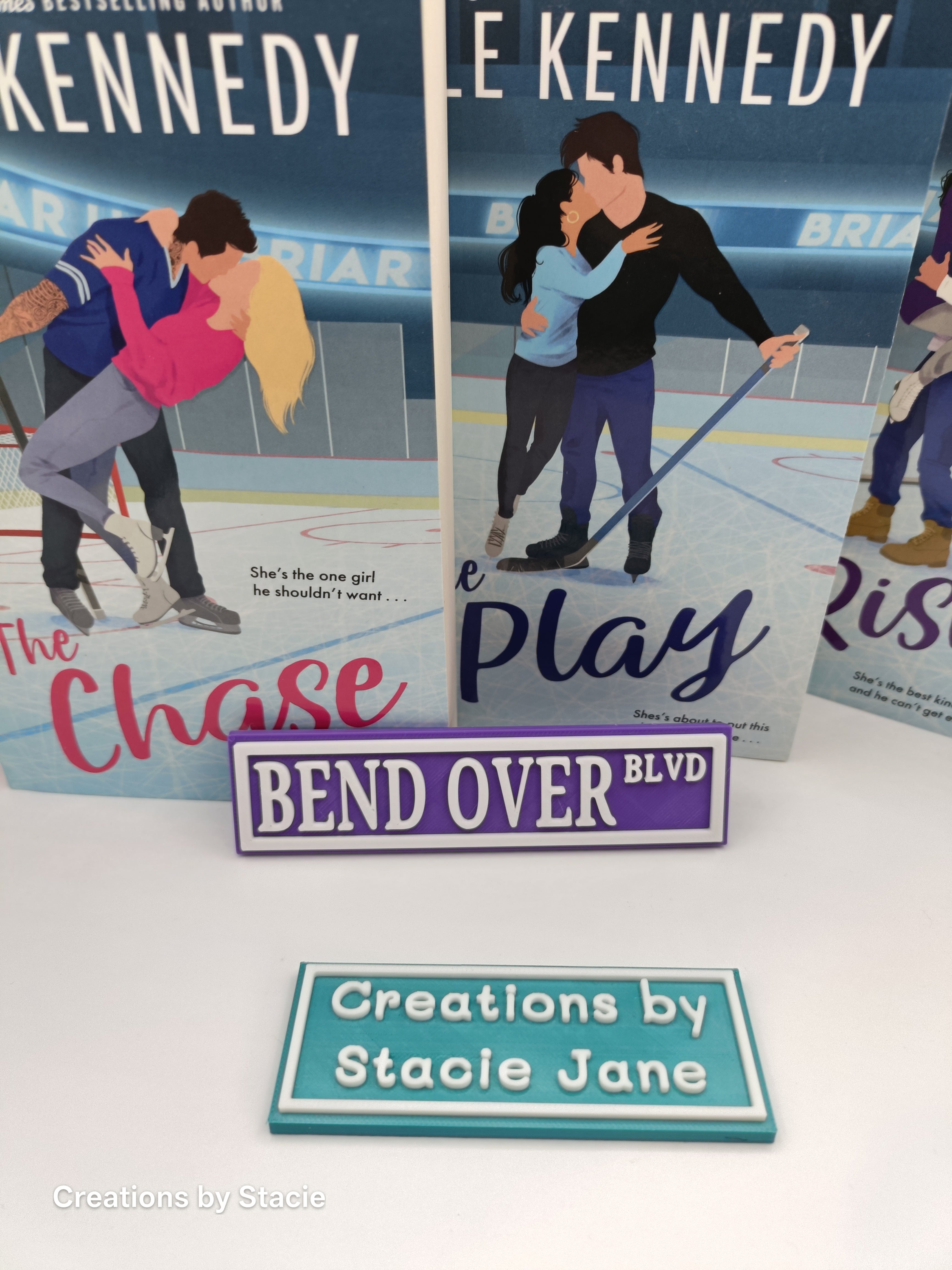 Bend Over book shelf sign