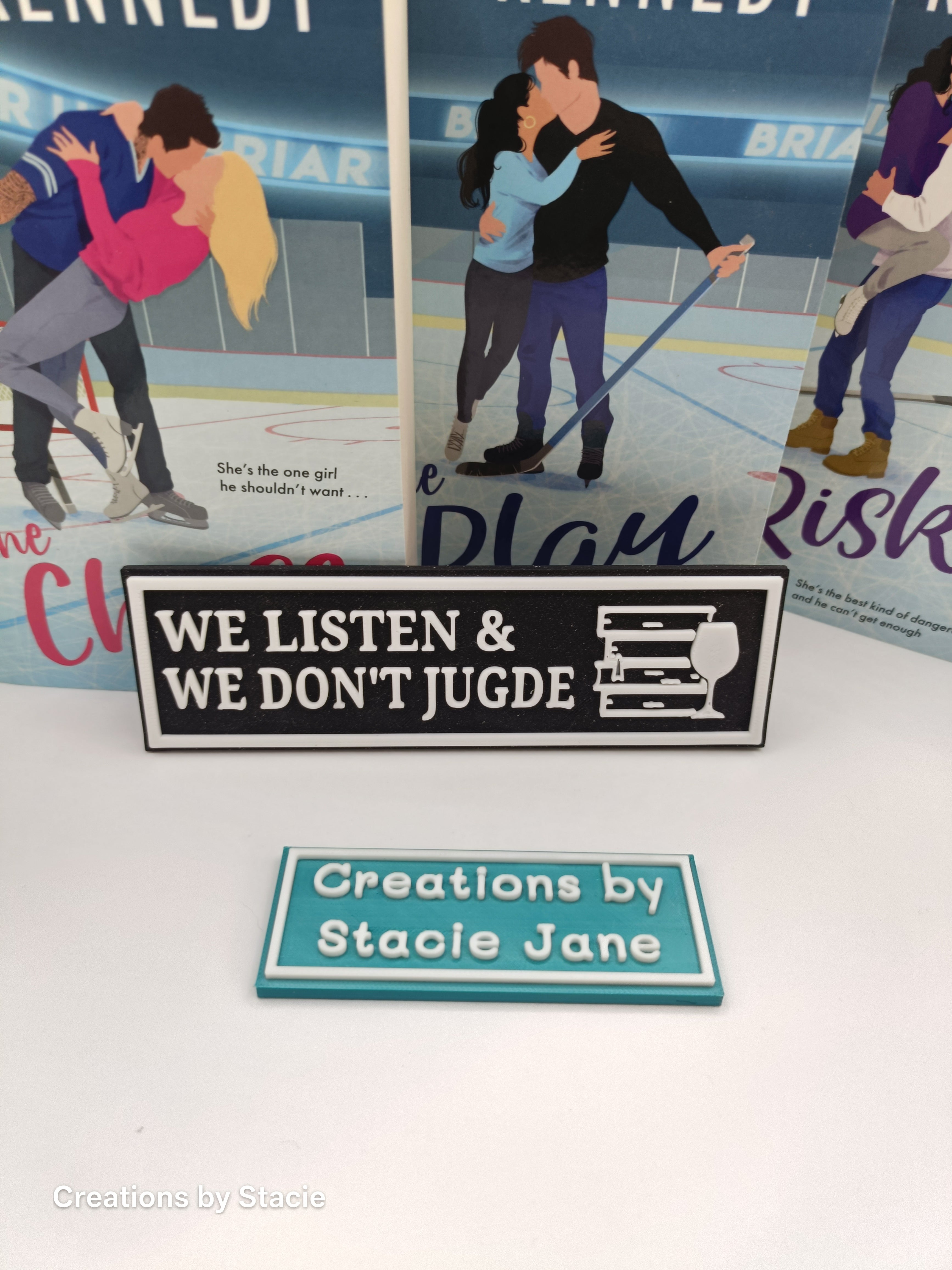We listen & we don't judge book shelf sign